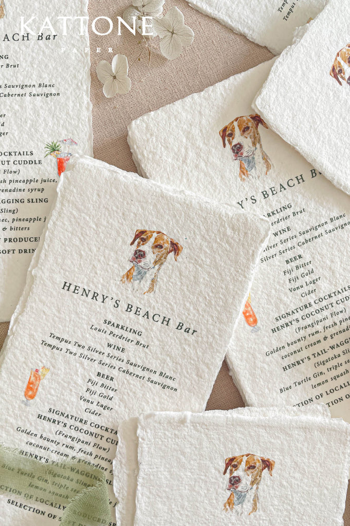 Custom watercolor-style dog illustration printed on handmade wedding menu adding a personalized touch.