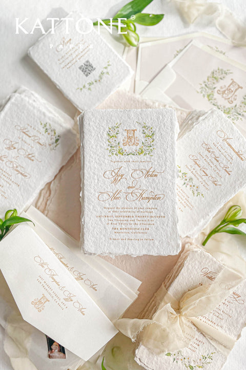 This exquisite deckle edge cotton rag suite offers a blend of natural elegance and personalized artistry. Perfect for a garden wedding, these beautiful invitations feature a bespoke watercolor design crest monogram created just for you. The luxurious, handmade paper adds a rich, organic texture, beautifully complementing the fine-art style of the crest and setting a romantic and sophisticated tone for your special day.