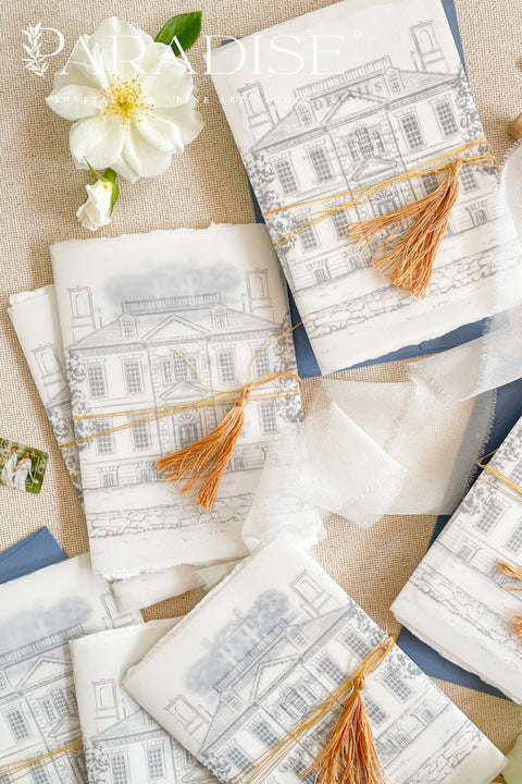 This exquisite wedding invitations suite offers a blend of rustic charm and personal romance. Each invitation features a bespoke custom venue illustration, hand-drawn by us to capture the unique charm of your location. The luxurious suite is finished with beautiful tassels, adding a touch of elegant texture and color. This rustic wedding stationery is perfect for a relaxed yet timeless celebration, and it sets a heartfelt and personal tone for your special day.