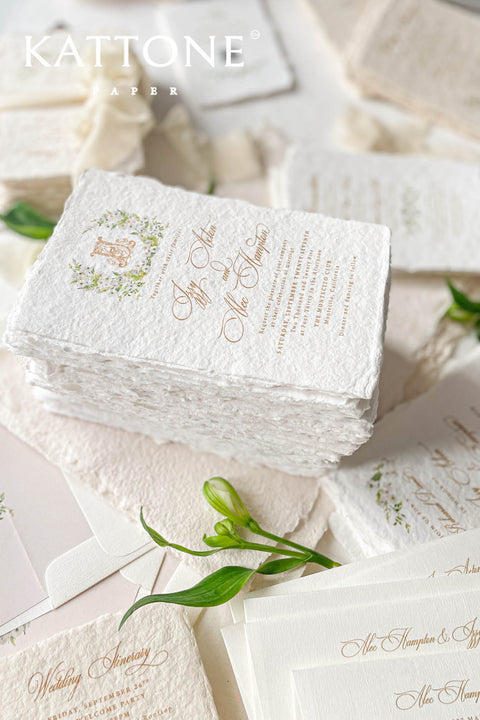 This exquisite deckle edge cotton rag suite offers a blend of natural elegance and personalized artistry. Perfect for a garden wedding, these beautiful invitations feature a bespoke watercolor design crest monogram created just for you. The luxurious, handmade paper adds a rich, organic texture, beautifully complementing the fine-art style of the crest and setting a romantic and sophisticated tone for your special day.