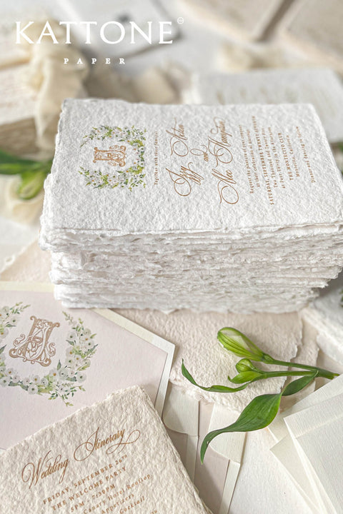 This exquisite deckle edge cotton rag suite offers a blend of natural elegance and personalized artistry. Perfect for a garden wedding, these beautiful invitations feature a bespoke watercolor design crest monogram created just for you. The luxurious, handmade paper adds a rich, organic texture, beautifully complementing the fine-art style of the crest and setting a romantic and sophisticated tone for your special day.