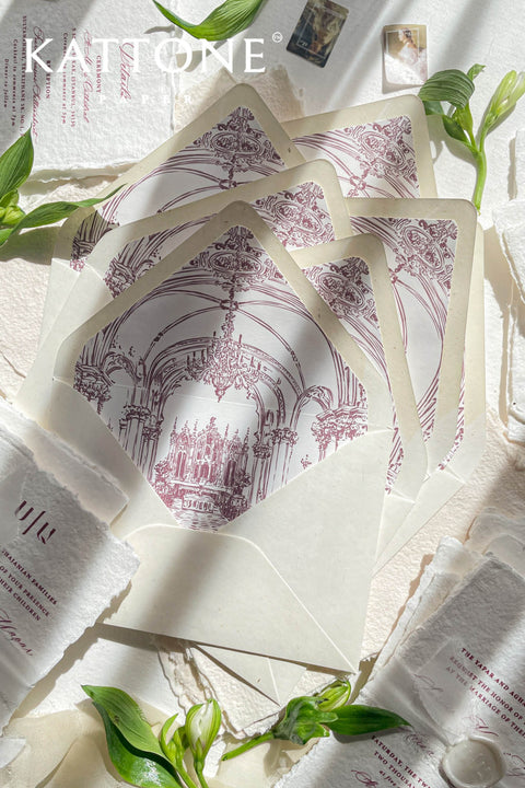 Stack of envelopes with hand-drawn venue liners visible, highlighting consistent illustration, clean edges, and premium stationery quality.