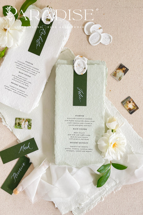 Add a refined botanical touch to your reception with our colored handmade paper wedding menus, crafted from 100% cotton rag paper and finished in a delicate sage green tone. Each menu features hand-torn deckled edges, elegant typography, and a deep green name tag topped with a custom wax seal, creating a luxurious and organic fine-art aesthetic. The soft, nature-inspired color palette perfectly complements garden, vineyard, or outdoor weddings.