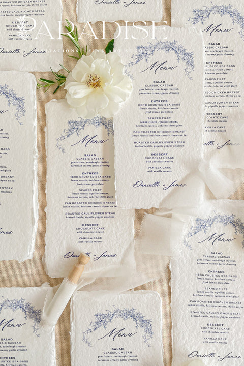 Add timeless artistry to your reception tables with our handmade paper wedding menus, elegantly designed with blue botanical illustrations and deckled edges for a refined fine-art aesthetic. Crafted from 100% cotton rag paper, each piece celebrates artisanal craftsmanship with a naturally soft texture that complements romantic, classic, and garden-inspired weddings alike.