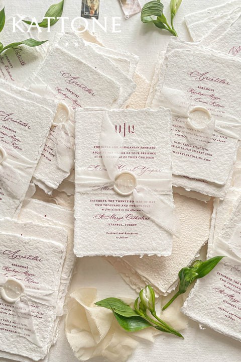 Announce your special day with the effortless, romantic charm of these handmade paper wedding invitations. Crafted for a boho wedding, this suite captures the free-spirited beauty of the season. Each invite is printed on soft and luxurious cotton paper, providing a unique, tactile experience for your guests. The light, airy design and premium paper are the perfect combination for a memorable summer wedding.