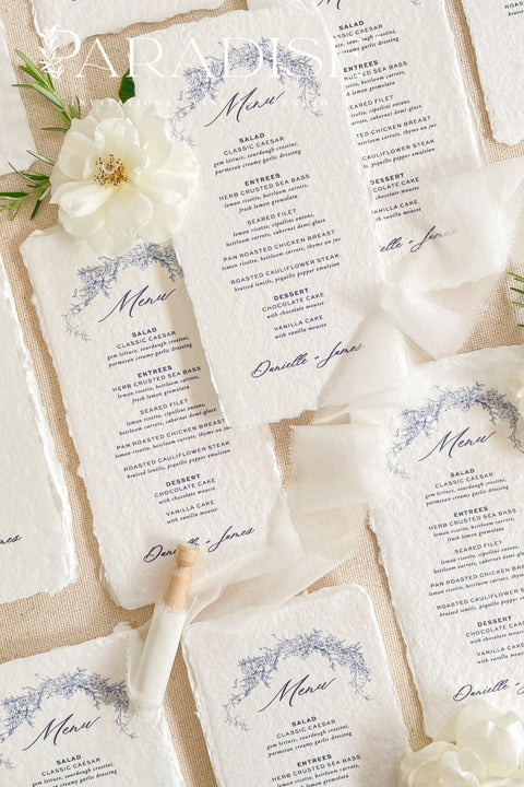Add timeless artistry to your reception tables with our handmade paper wedding menus, elegantly designed with blue botanical illustrations and deckled edges for a refined fine-art aesthetic. Crafted from 100% cotton rag paper, each piece celebrates artisanal craftsmanship with a naturally soft texture that complements romantic, classic, and garden-inspired weddings alike.
