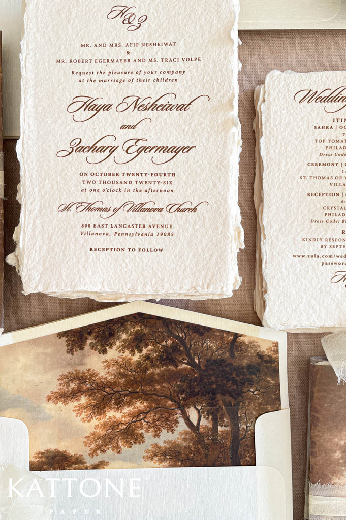 Luxury wedding stationery featuring flowing script and classic serif typography in warm brown tones for a sophisticated timeless aesthetic.