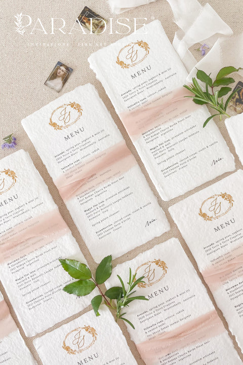 Add an air of refined romance to your wedding reception with our handmade paper wedding menus, beautifully adorned with a custom monogram and silk ribbon. Each menu is printed on luxurious 100% cotton rag paper with soft, torn deckled edges - a hallmark of artisanal craftsmanship. Designed for couples who value timeless design and tactile beauty, these menus feature elegant gold monograms paired with delicate blush silk ribbon wraps, creating a cohesive, fine art-inspired look.