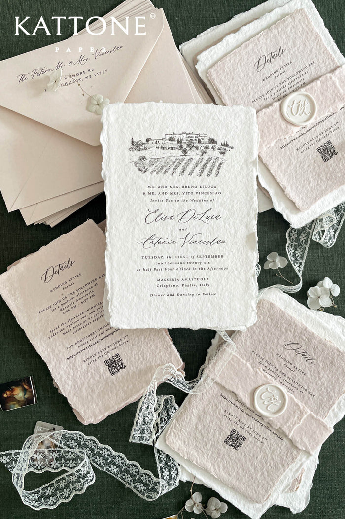 Luxury handmade cotton paper wedding invitation with deckled edges and venue illustration, styled with blush inserts, lace ribbon, wax seals and neutral envelopes on deep green background.