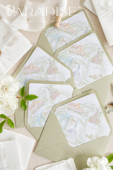Elegant matcha green envelopes arranged with floral details for refined wedding invitations.