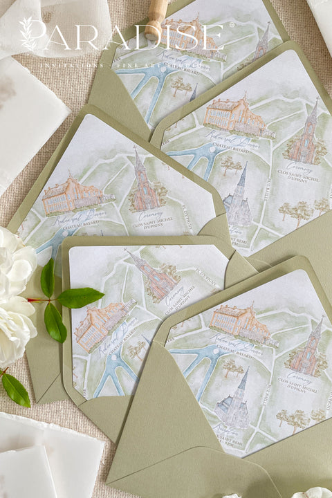 Elegant matcha green envelopes arranged with floral details for refined wedding invitations.