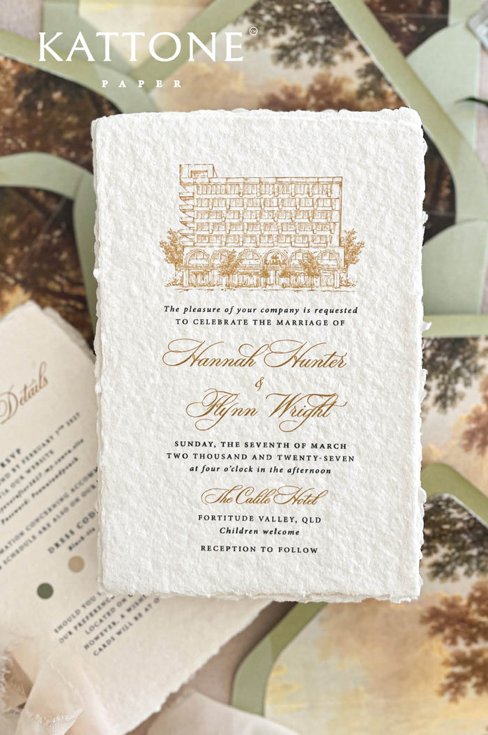 Luxury handmade paper wedding invitation with deckled edges and architectural venue illustration printed on cotton paper.