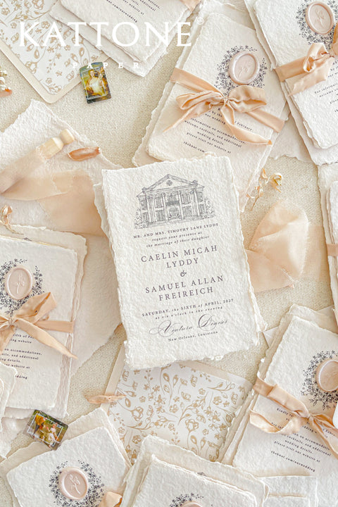 Invite your guests to your special day with the artful and personal charm of these custom wedding invitations. The unique suite features a beautiful, custom venue illustration sketch, hand-drawn by us to capture the essence of your wedding location. Designed with a light summer breeze theme and a boho chic aesthetic, this wedding stationery sets a warm, relaxed, and intimate tone for your upcoming celebration.