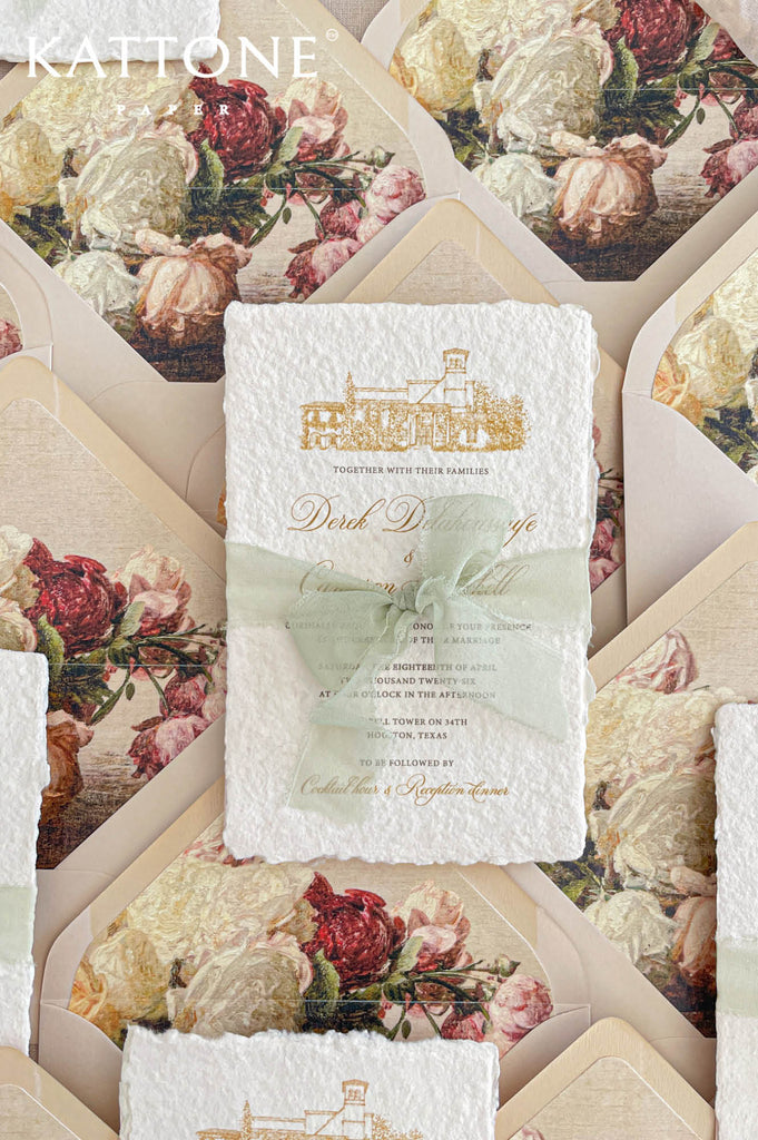 Handmade cotton paper with visible fibers and organic deckled edges creating a soft artisanal texture.