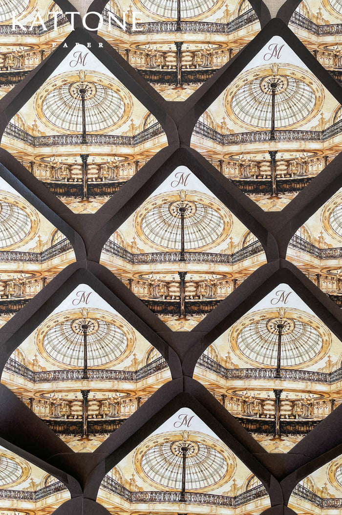 Luxury dark brown wedding envelopes with custom architectural venue liners and white ink address printing featuring elegant interior artwork.