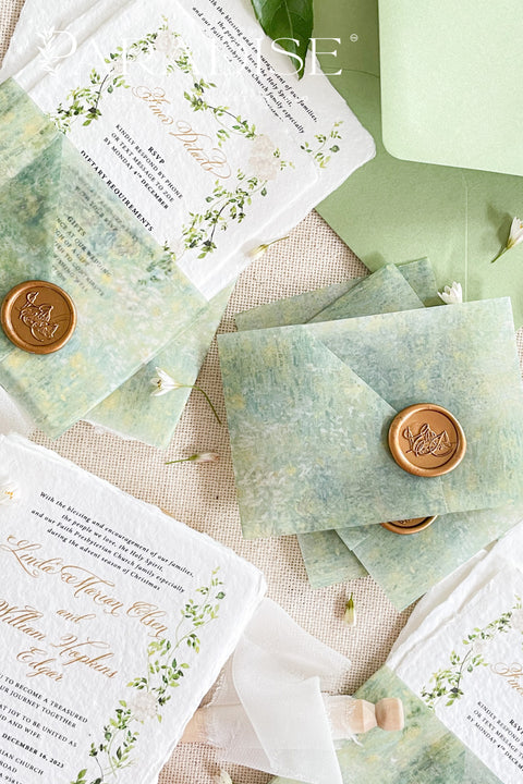 This exquisite wedding invitation set offers a blend of natural elegance and personalized artistry. Perfect for a garden green wedding, these beautiful custom elegant invites are printed on luxurious handmade deckled edge paper, which provides a rich, tactile feel and a truly unique finish. The result is a stationery suite that is both sophisticated and harmonious, beautifully capturing the essence of your special day.