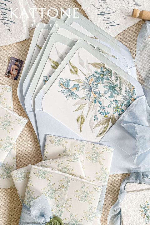 Set a sophisticated and thoughtful tone for your coastal celebration with these unique wedding invites. Perfect for a beach wedding, this suite features a classic navy theme with a beautifully designed wedding timeline to guide your guests through your special day. The elegant calligraphy design adds a touch of classic romance, while the eco-conscious materials ensure your stationery is a beautiful and responsible choice for your special day.