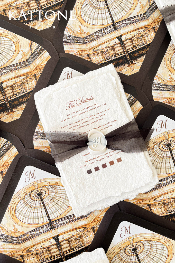Chocolate brown wedding envelopes with custom architectural venue liners featuring detailed illustrated interior artwork for a refined luxury aesthetic.
