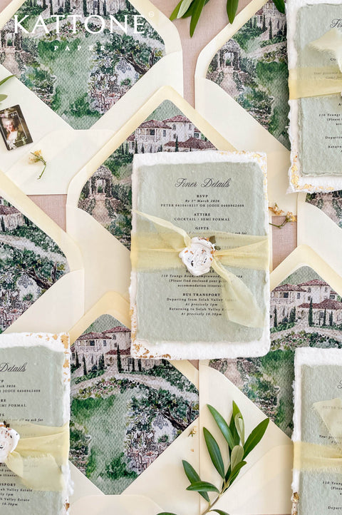 Complete luxury wedding invitation suite including handmade invitation, gold edging, ribbon wrap and illustrated envelope liners.
