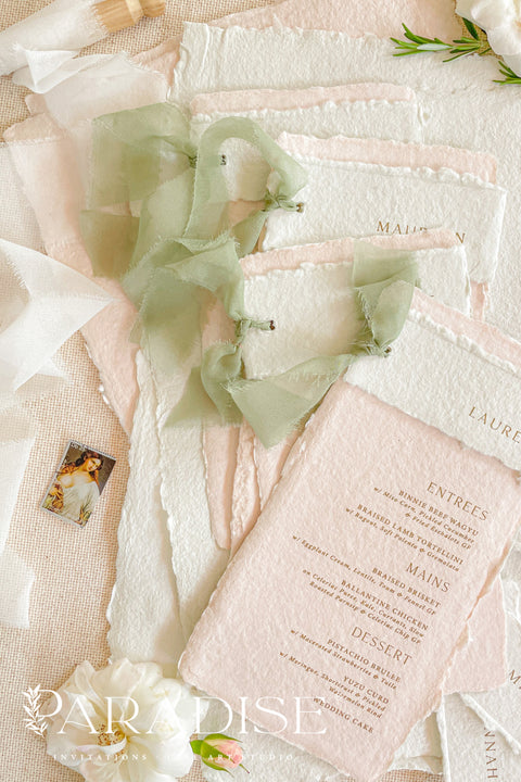 Elevate your wedding tablescape with our colored handmade paper wedding menus, designed to add an elegant pop of romance and texture. Crafted from 100% cotton rag paper, these menus feature a soft blush tone paired with an ivory header, hand-torn deckled edges, and subtle gold printing for a refined fine-art aesthetic. The delicate contrast between pastel hues and natural textures makes these menus ideal for garden weddings, destination celebrations, and fine-art receptions.