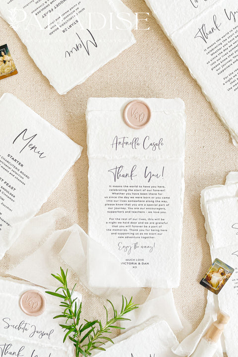 A refined handmade paper thank you card designed to express gratitude with sincerity and understated elegance. Crafted from luxurious cotton rag paper with natural deckled edges, this design pairs modern calligraphy with a clean, timeless layout. Perfect for weddings, celebrations, and meaningful events, it offers a heartfelt way to share appreciation while becoming a keepsake your guests will treasure.