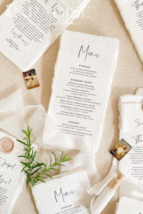 Elevate your table styling with our luxury handmade paper wedding menus, designed for couples who value timeless artistry and understated sophistication. Crafted from 100% cotton rag paper with deckled edges, these menus combine the charm of organic texture with minimalist modern typography. Each piece is individually torn, pressed, and printed by hand - ensuring every menu feels as unique as your celebration.