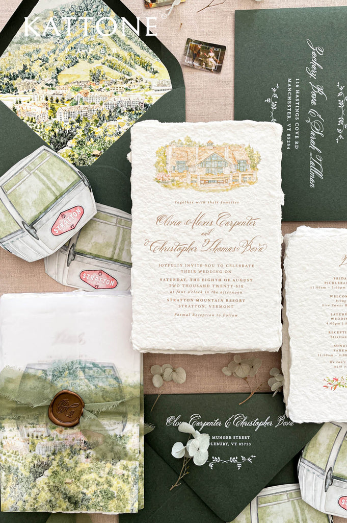 Premium handmade paper wedding invitation suite with custom watercolor venue illustration, scenic vellum wraps, deckled edge cotton paper, sage green envelopes, wax seal accents, and fine art stationery details for elegant destination weddings.
