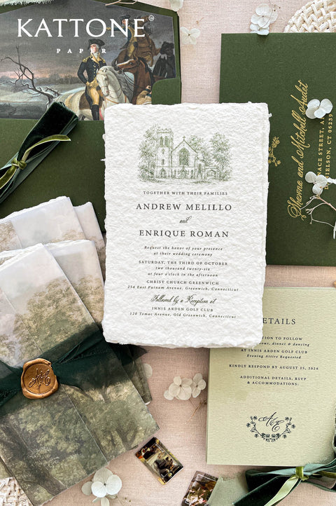 Luxury handmade paper wedding invitation suite with vellum covers, olive green envelopes, velvet ribbon, and wax seal.