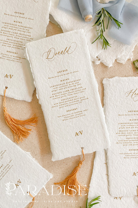Elevate your table styling with our handmade paper wedding menus with tassels, where timeless craftsmanship meets modern sophistication. Each menu is hand-torn from 100% cotton rag paper, featuring natural deckled edges, elegant typography, and a custom tassel accent that adds texture, movement, and warmth to your table setting. Perfect for bohemian, Mediterranean, or fine art-inspired weddings, these menus combine old-world artistry with contemporary luxury.