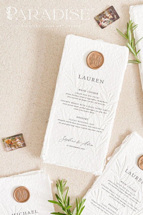 Introduce timeless refinement to your reception tables with our embossed handmade paper wedding menus, a stunning fusion of artisanal craftsmanship and fine art design. Each menu is carefully hand-pressed on 100% cotton rag paper with naturally torn deckled edges, featuring a beautifully embossed botanical pattern that adds depth, texture, and elegance.