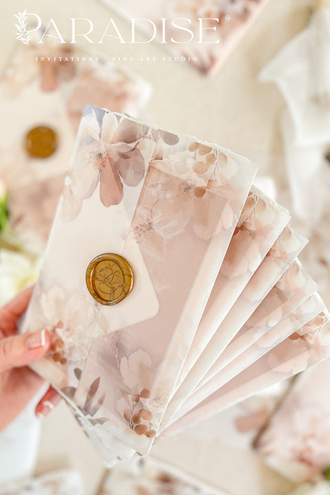 This exquisite wedding invites suite offers a blend of natural texture and romantic charm, perfect for an autumn wedding. Each piece is beautifully embossed with a delicate botanical design onto luxurious deckle edge cotton rag paper, providing a rich, tactile feel. The result is a truly romantic botanical wedding stationery set that captures the warm, earthy tones and intimate feel of the season.