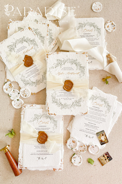 Introduce your wedding with the timeless and romantic feel of these handmade wedding invites. Each invitation is a work of fine art, crafted on luxurious, artisan deckle edge paper, giving it an organic, delicate texture that your guests will love to touch. The elegant modern calligraphy adds a touch of chic sophistication, making this suite a beautiful and personal preview of your special day.