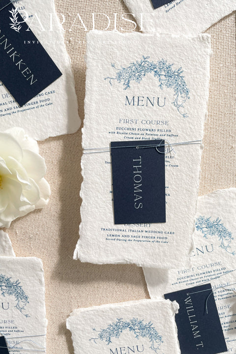 Bring timeless refinement to your reception with these handmade paper wedding menus, featuring a deep navy name tag and blue botanical artwork delicately printed on luxurious cotton paper. Each piece is hand-torn with naturally deckled edges, offering an authentic fine-art texture that perfectly complements elegant, coastal, or destination weddings. Perfectly suited for formal receptions, fine-art weddings, and refined dinner parties.