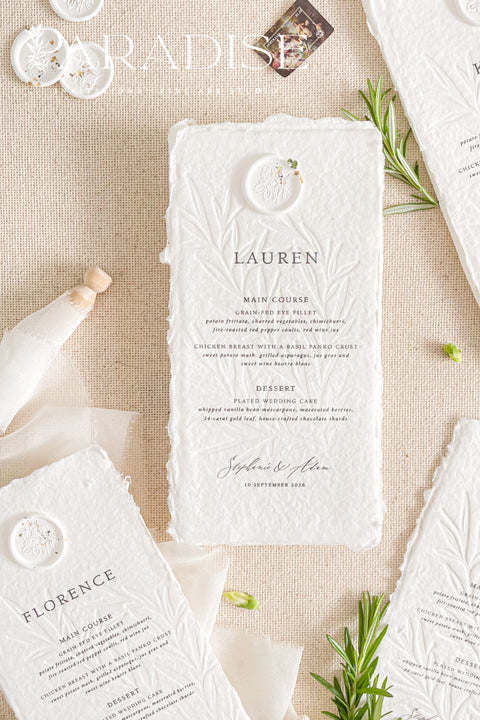 Elevate your wedding tablescape with our embossed handmade paper wedding menus, thoughtfully designed for couples seeking timeless sophistication. Crafted from 100% cotton rag paper with deckled edges and a delicate embossed botanical motif, each menu exudes fine-art elegance. The addition of a wax seal with hand-painted floral accents completes the romantic, artisanal look.