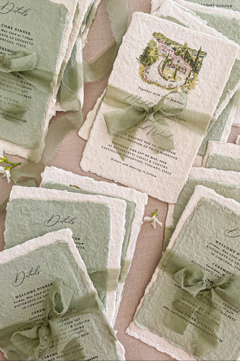 Complete luxury wedding invitation suite including handmade invitation, watercolor liners, inserts and silk ribbon styling.