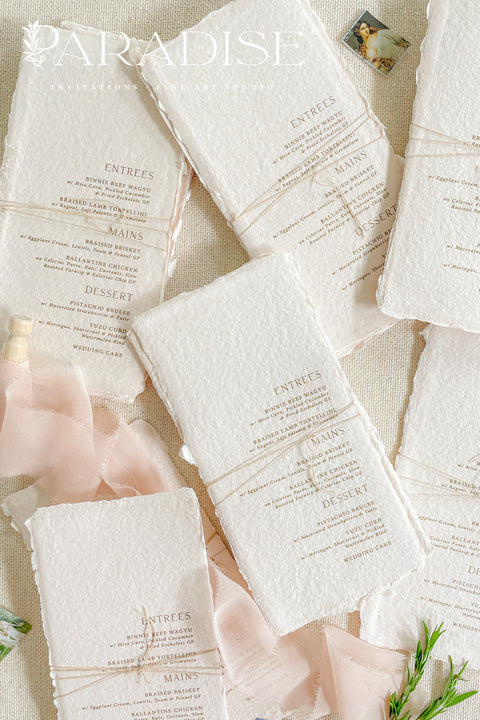 Elevate your table styling with our handmade paper wedding menus with tassels, where timeless craftsmanship meets modern sophistication. Each menu is hand-torn from 100% cotton rag paper, featuring natural deckled edges, elegant typography, and a custom tassel accent that adds texture, movement, and warmth to your table setting. Perfect for bohemian, Mediterranean, or fine art-inspired weddings, these menus combine old-world artistry with contemporary luxury.