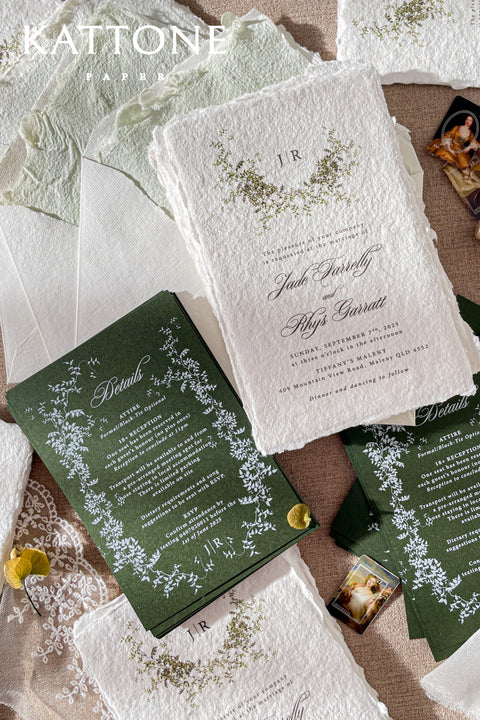 Announce your wedding with this handmade paper wedding invitation suite celebrates the timeless beauty of nature through elegant botanical elements and lush greenery. Each invitation is printed on luxury deckled-edge cotton paper, with soft, organic texture that evokes warmth and authenticity. Delicate hand-illustrated foliage create a graceful balance of refinement and natural charm. Paired with deep green inserts featuring botanical detailing in white ink, the suite embodies understated sophistication.