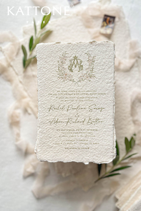 Soft, organic, and undeniably romantic - this colored handmade paper wedding invitation suite beautifully captures the essence of nature-inspired elegance. Printed on luxury blush-toned deckled-edge cotton paper, each piece is a work of art, blending timeless craftsmanship with delicate botanical elements and refined greenery details. At its heart lies a custom hand-drawn monogram, surrounded by soft watercolor foliage - a symbol of the couple’s unity and natural grace. 