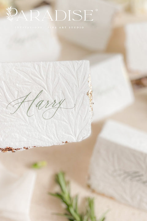 Elevate your table setting with our embossed handmade paper place cards - a luxurious detail for weddings, bridal showers, and upscale events. Each card is crafted from premium cotton rag paper, featuring a soft deckled edge, botanical embossing, and elegant calligraphy. Perfect for seating arrangements, escort cards, or personalized name tags, these artisanal pieces bring a touch of organic elegance to any celebration. 