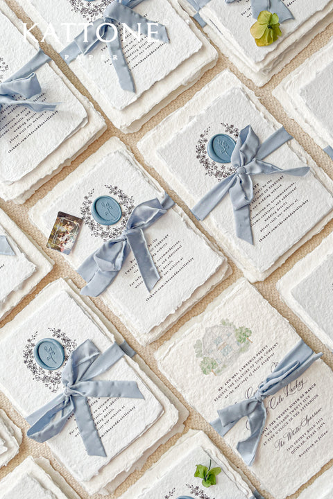 Celebrate your special day with our exquisite Wedding Invitations, featuring a stunning watercolor venue illustration. Each invite is crafted from premium handmade paper with a beautiful deckled edge, adding a touch of elegance to your wedding. Perfect for couples who appreciate artistry and personalization. Contact for a quote tailored to your needs. Make your invitations as unforgettable as your love story with our unique designs.&nbsp;