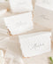 Elevate your table setting with our embossed handmade paper place cards - a luxurious detail for weddings, bridal showers, and upscale events. Each card is crafted from premium cotton rag paper, featuring a soft deckled edge, botanical embossing, and elegant calligraphy. Perfect for seating arrangements, escort cards, or personalized name tags, these artisanal pieces bring a touch of organic elegance to any celebration. 