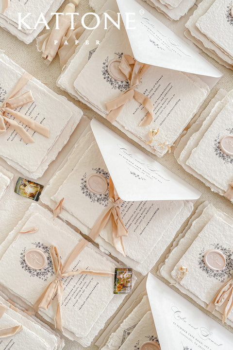 Invite your guests to your special day with the artful and personal charm of these custom wedding invitations. The unique suite features a beautiful, custom venue illustration sketch, hand-drawn by us to capture the essence of your wedding location. Designed with a light summer breeze theme and a boho chic aesthetic, this wedding stationery sets a warm, relaxed, and intimate tone for your upcoming celebration.