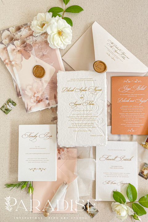 This exquisite wedding invites suite offers a blend of natural texture and romantic charm, perfect for an autumn wedding. Each piece is beautifully embossed with a delicate botanical design onto luxurious deckle edge cotton rag paper, providing a rich, tactile feel. The result is a truly romantic botanical wedding stationery set that captures the warm, earthy tones and intimate feel of the season.