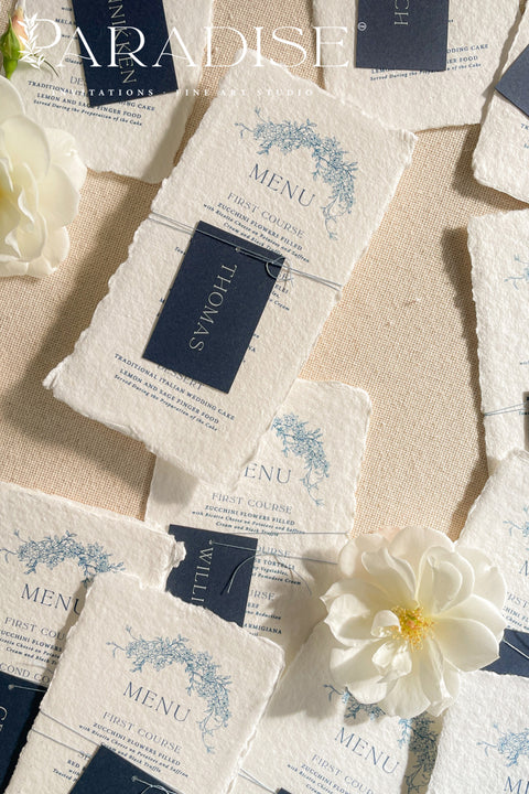 Bring timeless refinement to your reception with these handmade paper wedding menus, featuring a deep navy name tag and blue botanical artwork delicately printed on luxurious cotton paper. Each piece is hand-torn with naturally deckled edges, offering an authentic fine-art texture that perfectly complements elegant, coastal, or destination weddings. Perfectly suited for formal receptions, fine-art weddings, and refined dinner parties.