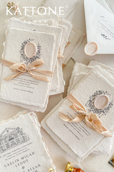 Invite your guests to your special day with the artful and personal charm of these custom wedding invitations. The unique suite features a beautiful, custom venue illustration sketch, hand-drawn by us to capture the essence of your wedding location. Designed with a light summer breeze theme and a boho chic aesthetic, this wedding stationery sets a warm, relaxed, and intimate tone for your upcoming celebration.
