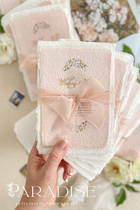 Announce your love story with timeless artistry through our handmade watercolor floral crest wedding invitations, where classic design meets modern elegance. Each invitation is crafted by hand and features a beautifully painted watercolor crest of delicate florals, personalized with your initials - a true symbol of your union.
