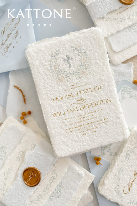 A serene and faith-inspired christening invitation crafted from luxurious handmade paper and adorned with soft watercolor botanicals. Featuring a delicate floral wreath and subtle Christian cross, this design blends timeless elegance with gentle color and refined typography. Perfect for baptisms and church ceremonies, it offers a meaningful keepsake that beautifully honors this sacred milestone.