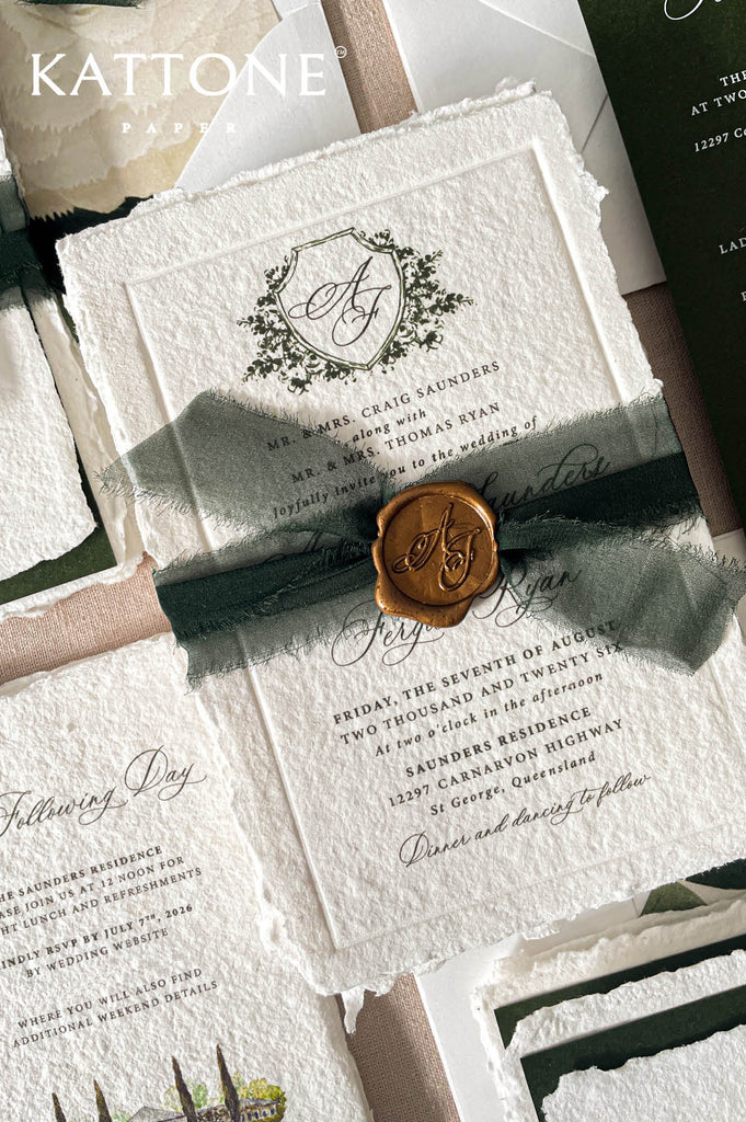 Custom crest design featuring elegant greenery and monogram details adds timeless sophistication and refined personalization.
