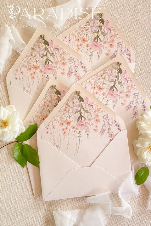 Luxury envelopes featuring watercolor floral liners arranged with floral details for romantic wedding invitations.
