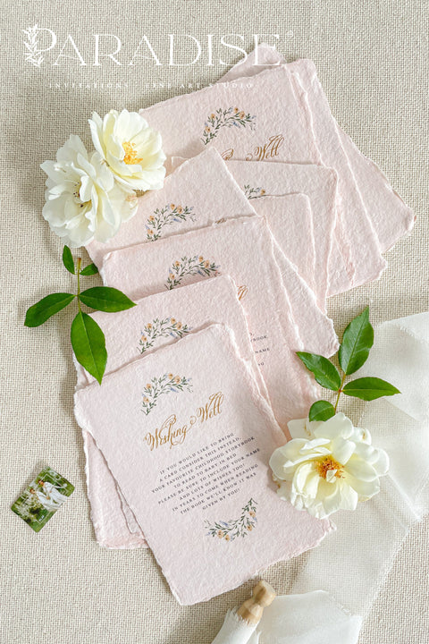 Announce your love story with timeless artistry through our handmade watercolor floral crest wedding invitations, where classic design meets modern elegance. Each invitation is crafted by hand and features a beautifully painted watercolor crest of delicate florals, personalized with your initials - a true symbol of your union.